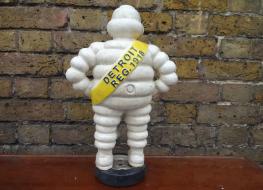 Michelin Man Standing On Tyre